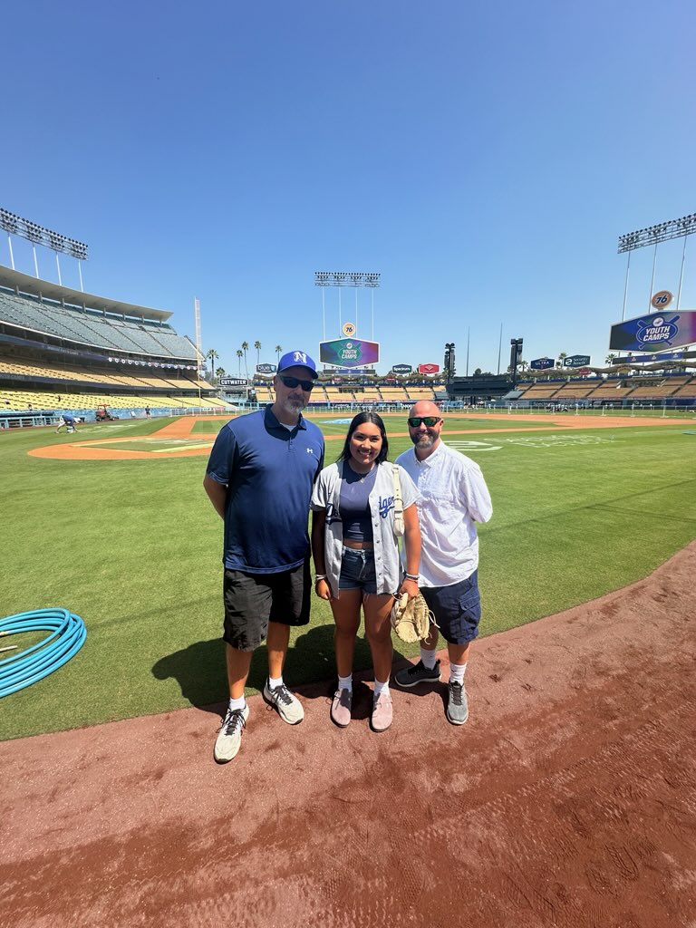 Mr. Bateman,  Mr. Andrade, and  Alejandra Romero enjoying their visit at Dodger Staduim.